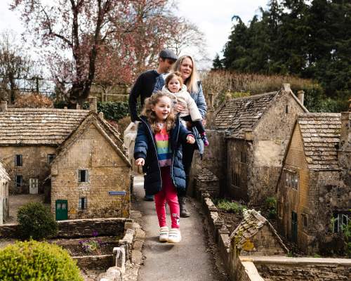 Family enjoying the Bourton on the Water model village