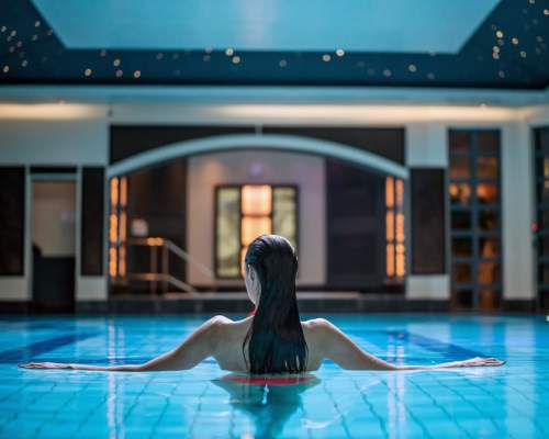 Careys Manor - Woman in the spa swimming pool