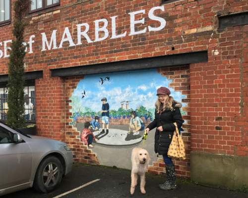 dilys outside house of marbles