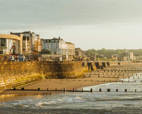 An image of golden hour looking up towards north Bridlington beach and promenade.