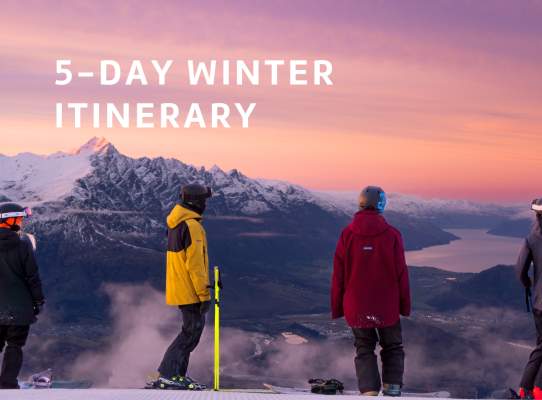 Front cover of a trade itinerary that says '5-day winter itinerary' with a picture of people standing at the top of a snowy mountain looking out to the basin in their ski gear