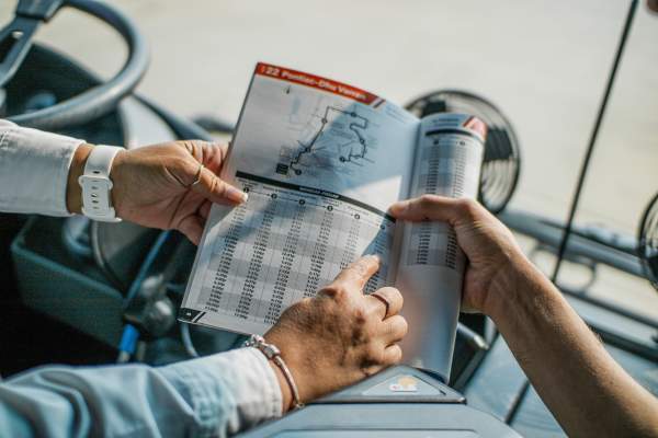 TheRide two people viewing bus route
