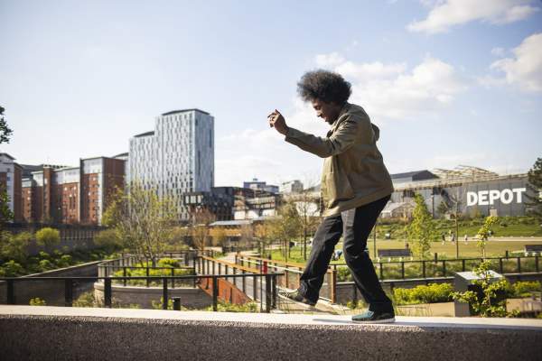 Person dancing outside of Depot Mayfield