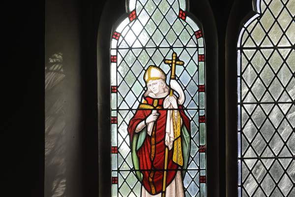 A stained glass window of Stephen Langton in a church