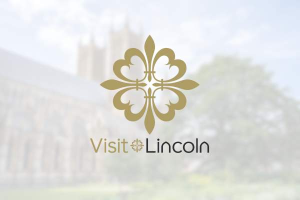 a visual of 'Visit Lincoln' logo