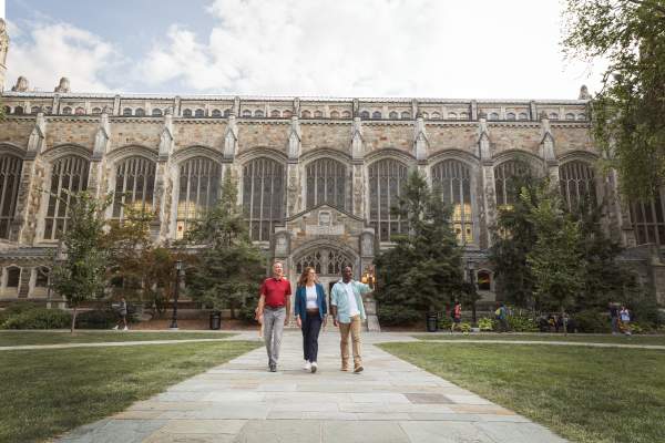Group of adults in U-M Law Quad
