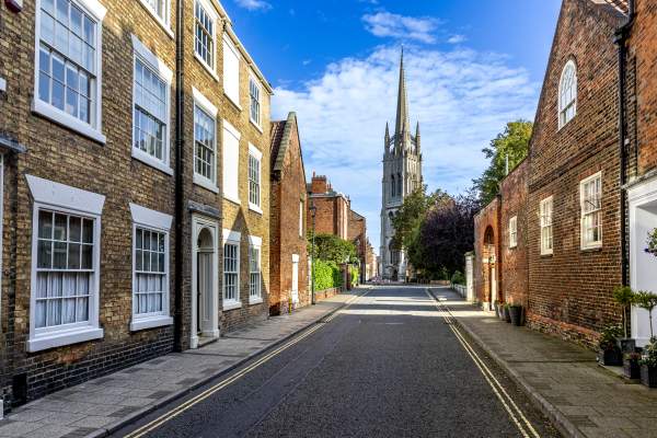 a street in Louth with a church at the end and houses either side