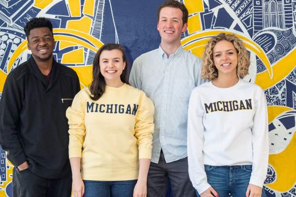 U-M students by Wings Mural
