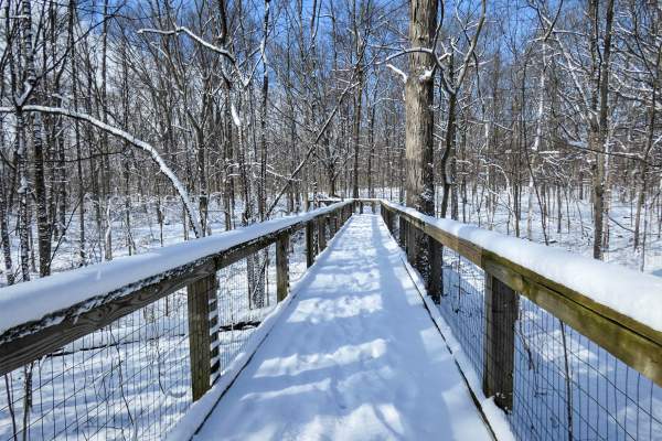 Snow covered Trail of Reflection at Lindenwood Nature Preserve in Fort Wayne