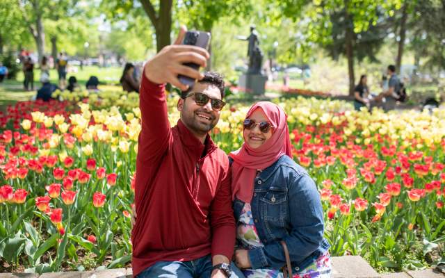 Couple taking selfie on phone at Centennial Park