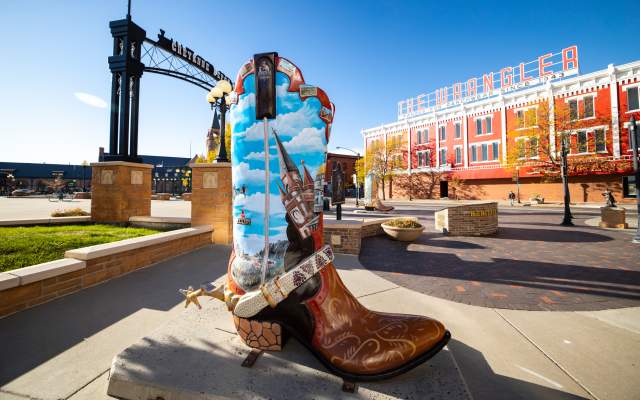 One of Cheyenne's Big Boots with the Wrangler Western Wear Store as a backdrop