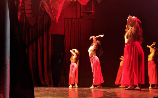Ballet dancers dressed in red at the Lincoln Theatre in Cheyenne