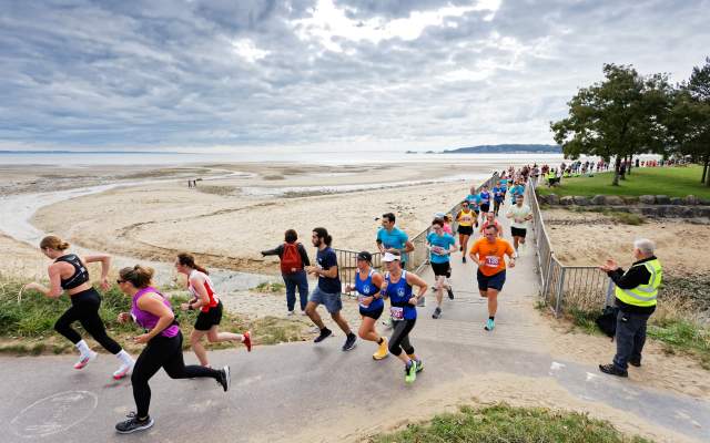 Runners in the Swansea Bay 10k running along Swansea Bay