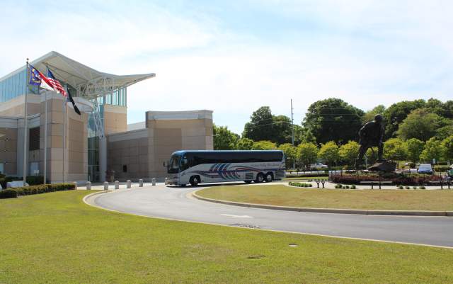 Motorcoach bus parked at Airborne and Special Operations Museum in Fayetteville NC