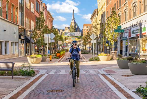 Angie Riding on Baltimore Street - Reimagine Cumberland