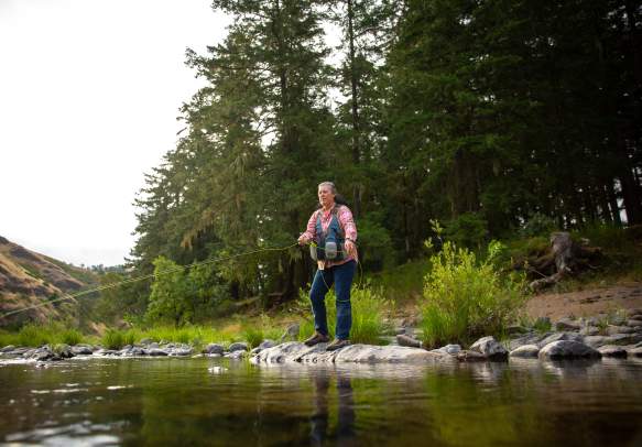 Fishing on the bank of the Umpqua River.