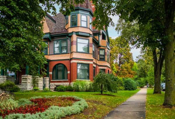 Exterior of Kneeland Walker House in Wauwatosa surrounded by greenery