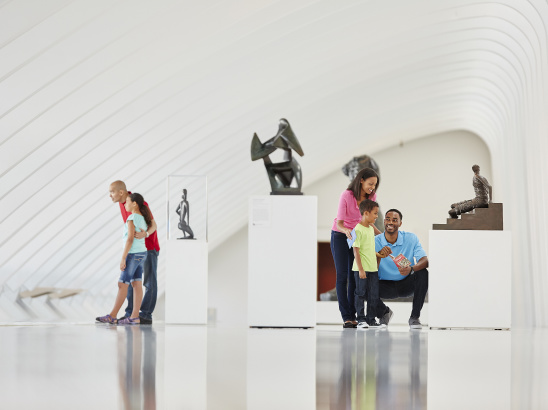 Familes looking around the Milwaukee Art Museum