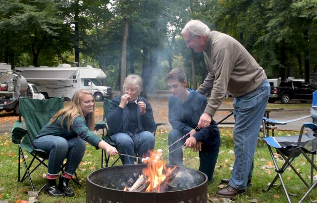 Family bonfire at Johnny Appleseed Park and Campground