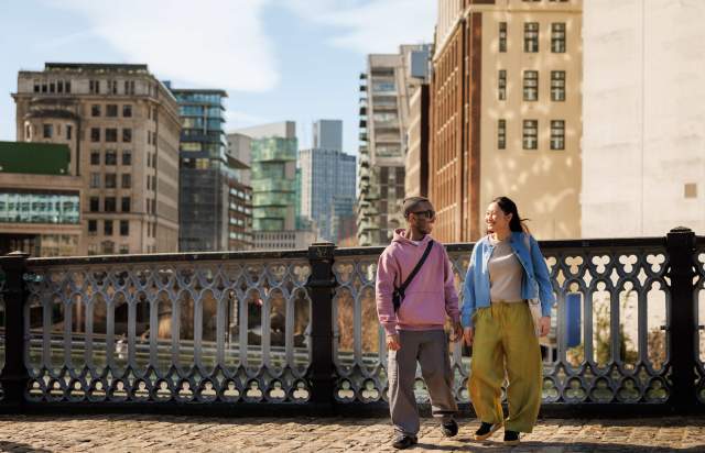 A couple on a bridge