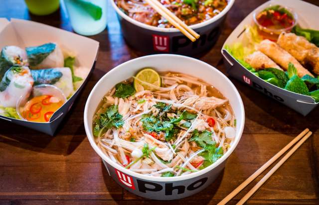 Vietnamese food in bowl with chopsticks