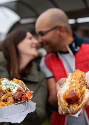 Couple at the food festival with food