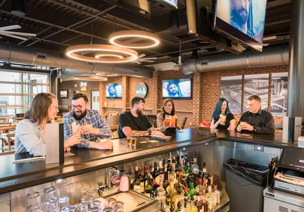 three couples at a bar