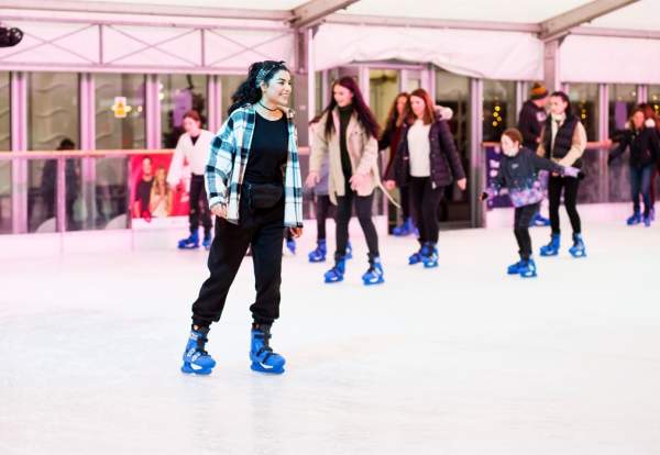 People skating at the Skate Manchester rink