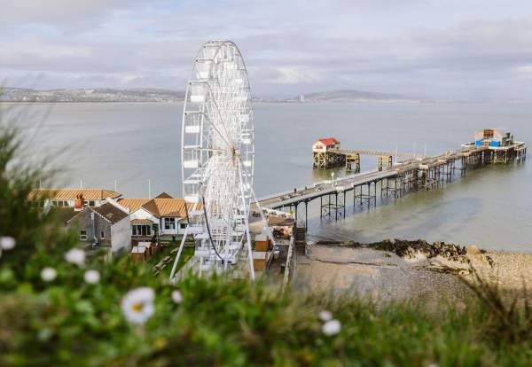 Large Ferris wheel next to Mumbles pier