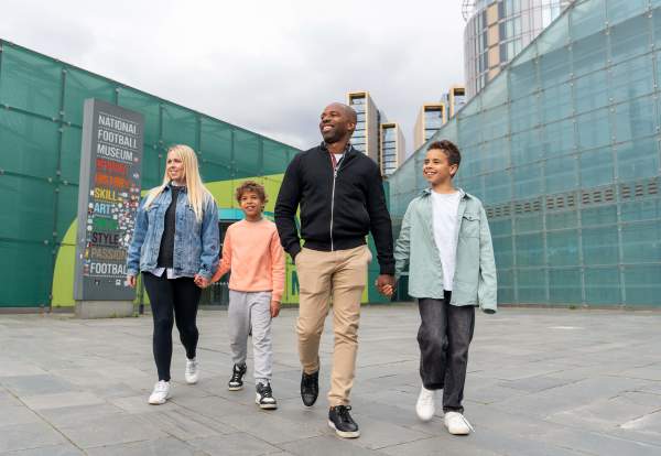 Family next to the National Football Museum