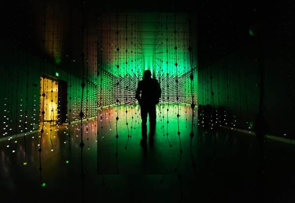 Silhouette of a person inside art installation