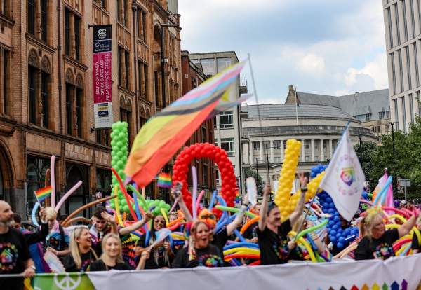 People celebrating Manchester Pride during the parade