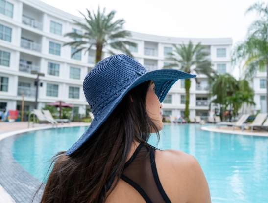 Woman at pool at Melia Orlando Celebration