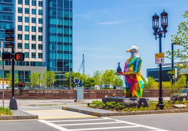 Colorful geometric sculpture of bird in Seaport District