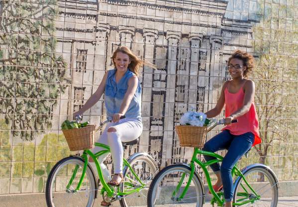 2 ladies on bikes