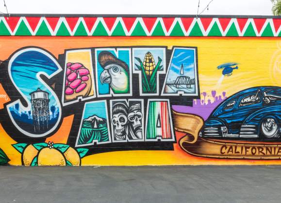 Santa Ana mural in parking lot