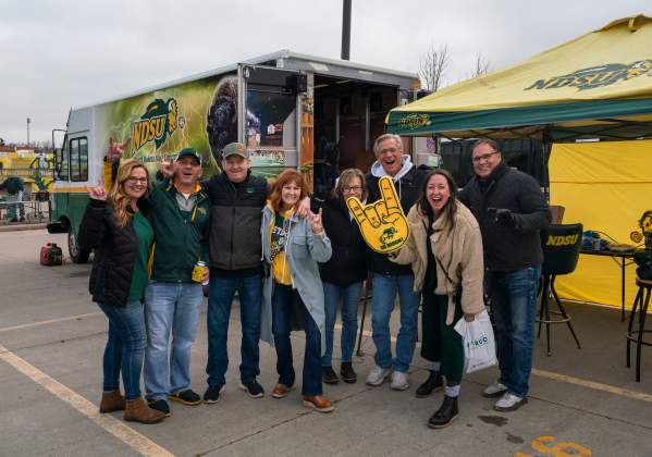 Fans posing at NDSU tailgating