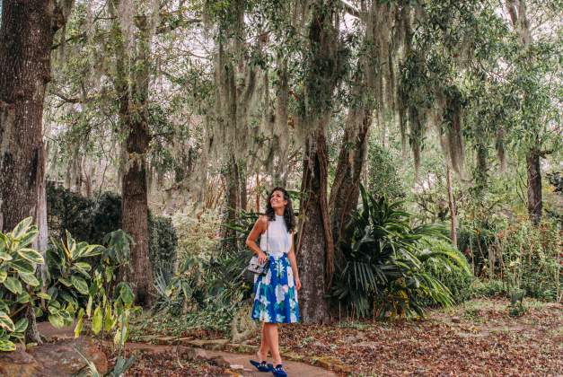 Woman looking up at the trees in Big Thicket