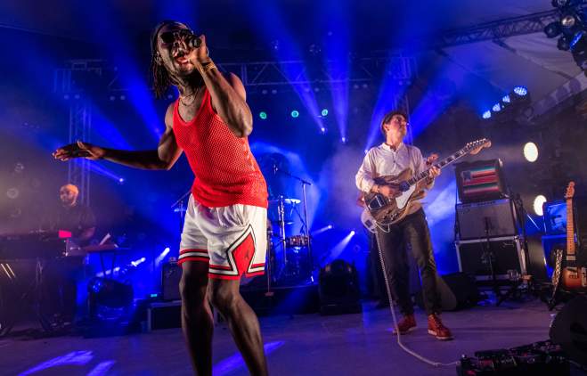 Black Pumas singer and guitarist on stage at Stubb's venue in Austin