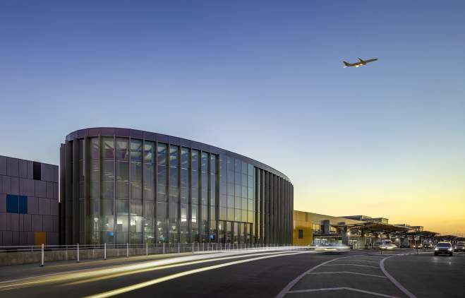 Austin airport east infill with plane flying overhead