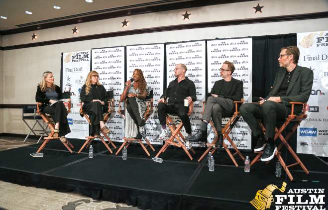 Filmmakers panel discussion at Austin Film Festival with six speakers seated on stage and event banners in the background.