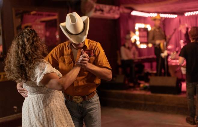Man and woman two-stepping at White Horse