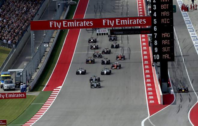 Formula 1 race cars coming down a straight at Circuit of The Americas in Austin, Texas.