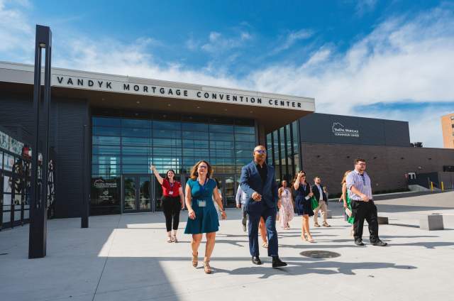 people exiting the conference center