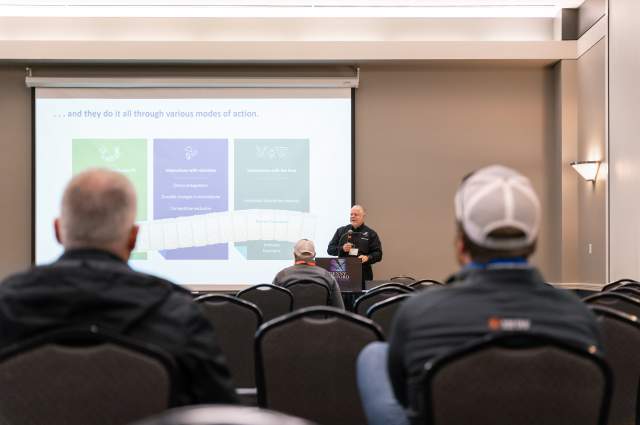Attendees Viewing a Projected Presentation