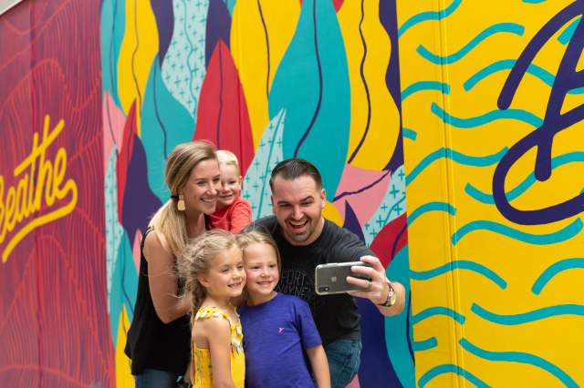 Family exploring the murals in Downtown Fort Wayne