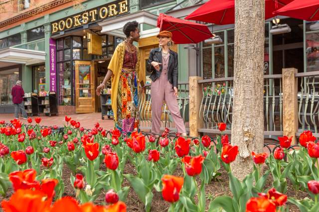 Two women on Pearl Street with tulips