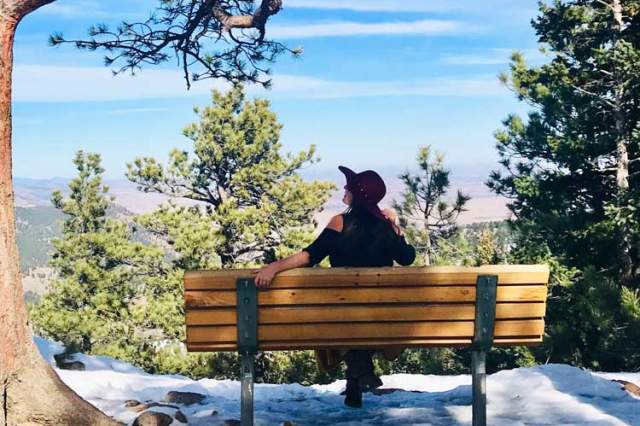 Solo Traveler Woman on Bench