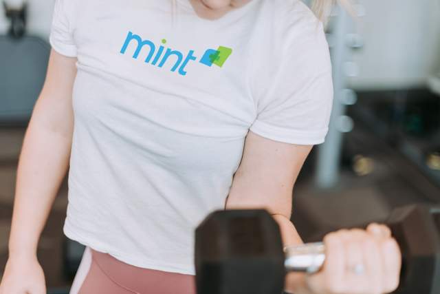 Woman working out in MINT+ t-shirt