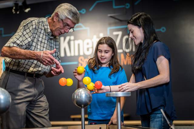 Orlando Science Center's Mini Maker Faire dad and girls